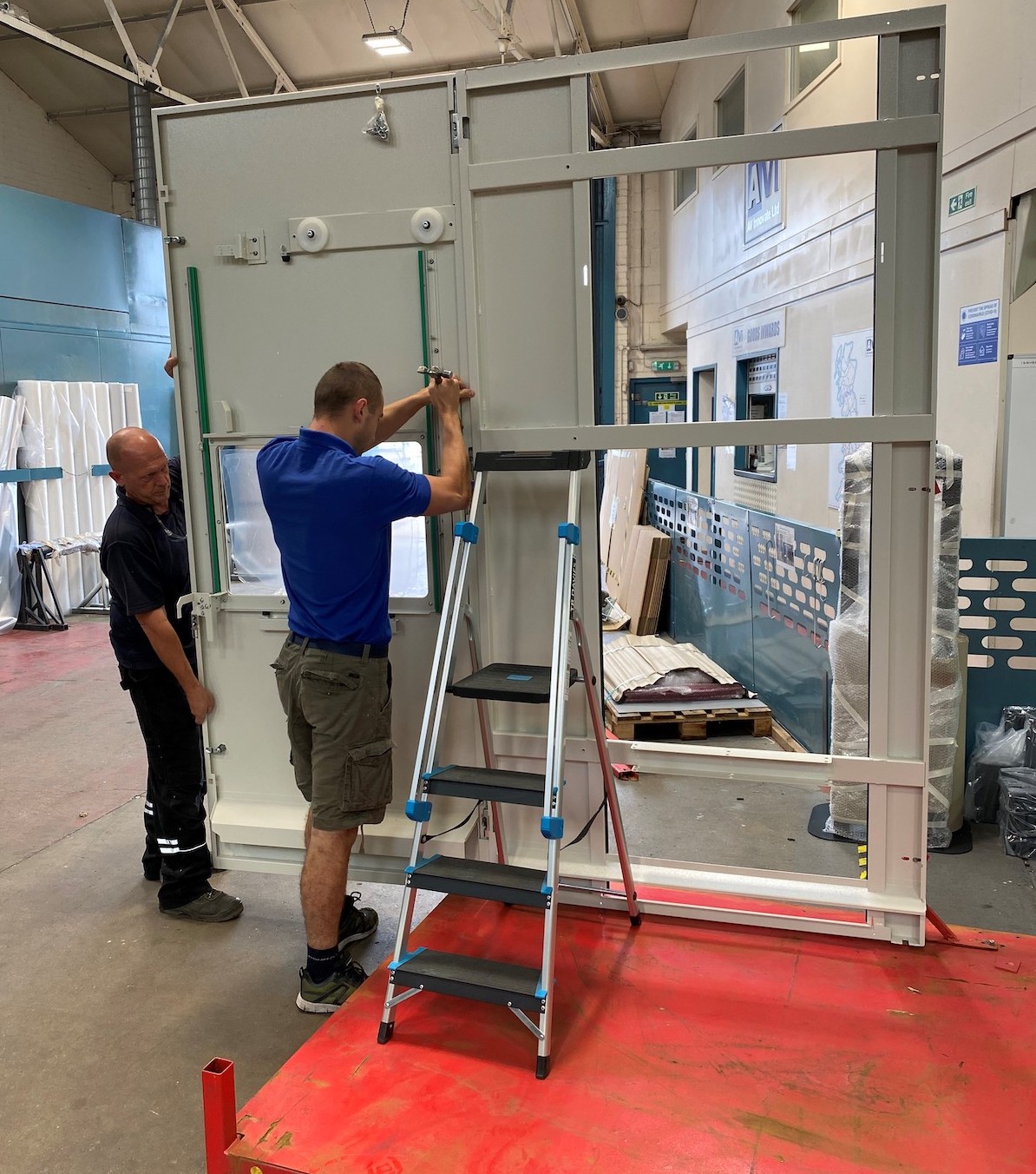 Man assembling metal frame