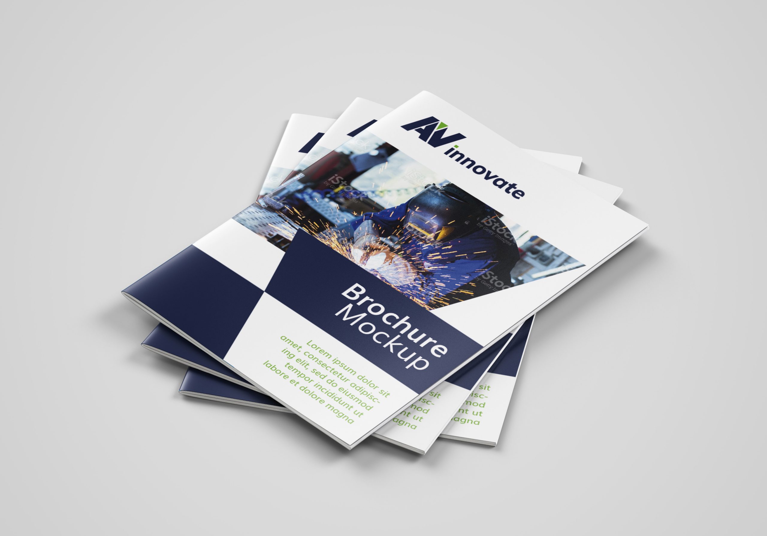 several brochure mockups stacked